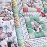 Want a Soft Fluffy Quilt? FMQ WiggleDitch sashes, Open Outline of only the main elements: the Butterflies!