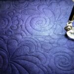 E2E FeatherParty quilting on royal blue fabric